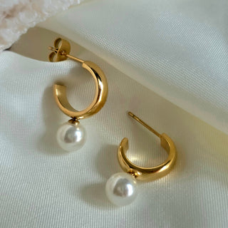 18k Waterproof Gold Hoop earrings with freshwater pearl drops on a white fabric background