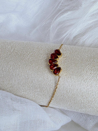 Red pomegranate seed charm adjustable chain bracelet in q8k real gold filled over titanium steel. Tarnishfree everyday dainty bracelet
