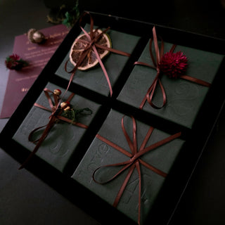 Four green ribboned Sunday boxes inside the ZOLÁI Advent box