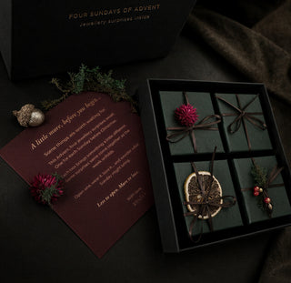 Open ZOLÁI Advent box with four Sunday boxes and note card