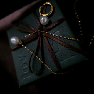 Pearl drop earrings on a ZOLÁI Advent Sunday box